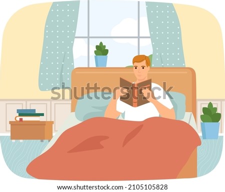 Cute man in pajamas reading literature on his bed comfortably. Book lover concept with young man lying relax on sofa and reading book. Concept of homeward and comfort. Person relaxes after work Royalty-Free Stock Photo #2105105828
