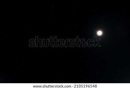 Moon and stars in the dark sky. Black sky with bright moon and little stars