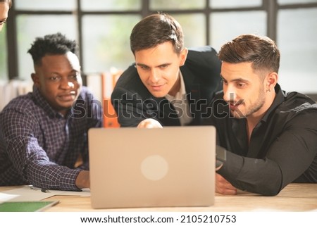Group of young smart business people working, communicating in modern office together with colleagues. Business teamwork has stategic planning in office. Asian woman. Business concept. 