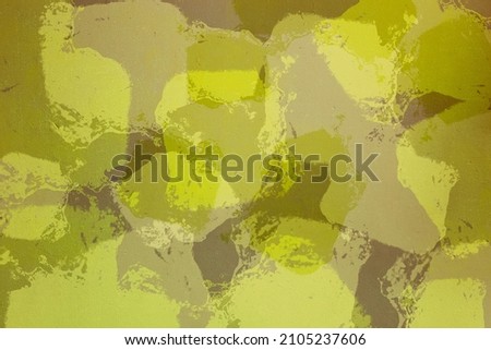 Camouflage painted background on a wall painted in various shades of green form an abstract artistic landscape with texture. Art design and backdrops.