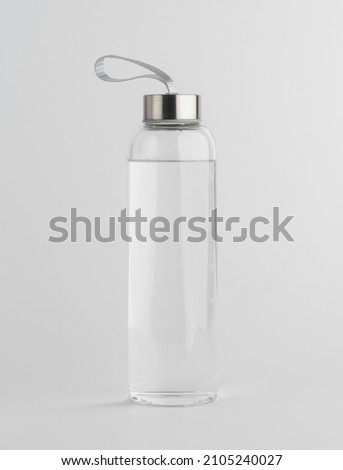 Glass water bottle. Isolated on a white background. Royalty-Free Stock Photo #2105240027