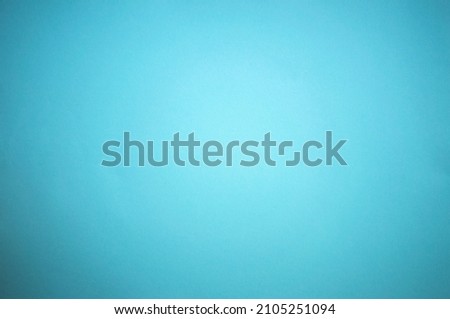 Photo of a blue clear background for text. Blue sea texture. The color of the sky.