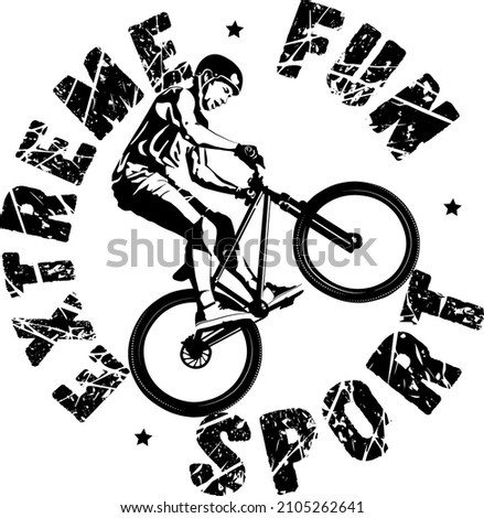 Mountain biker and grunge words extreme sport and fun