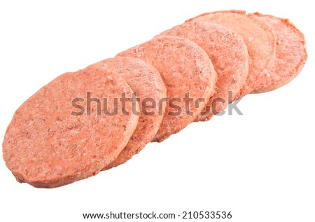 Frozen raw hamburger beef meat over white background