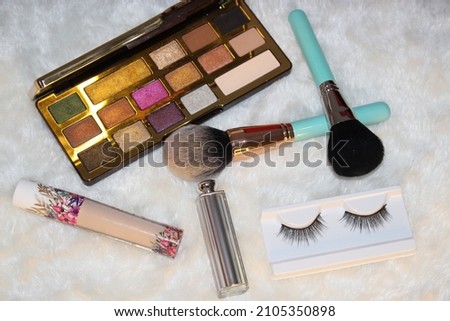 Photo of makeup and various accessories.