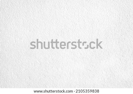 White foam board background. Styrofoam sheet texture backdrop. Expanded Polystyrene material packaging. Royalty-Free Stock Photo #2105359838