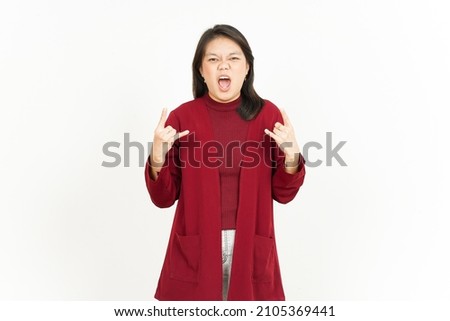 Showing Metal Hands Of Beautiful Asian Woman Wearing Red Shirt Isolated On White Background