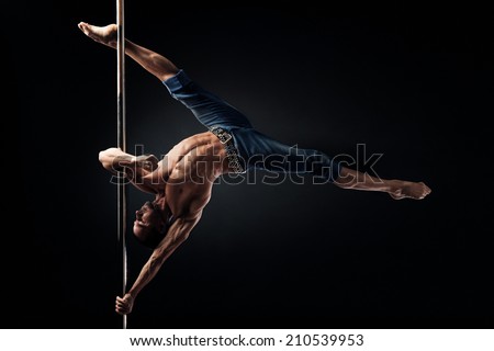 Pole Dance Male Athlete, aesha split Royalty-Free Stock Photo #210539953