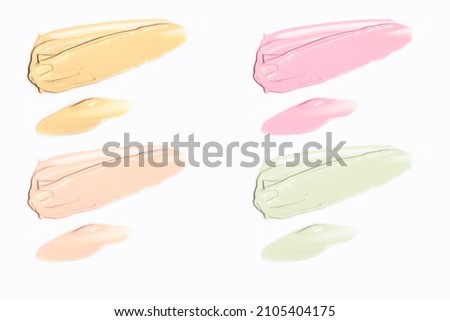 cosmetic makeup swatch smudge liquid texture foundation primer product with beauty fashion skincare, cc cream on white isolated background Royalty-Free Stock Photo #2105404175