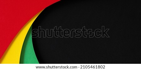 Abstract geometric black, red, yellow, green color background. Black History Month color background with copy space for text Royalty-Free Stock Photo #2105461802