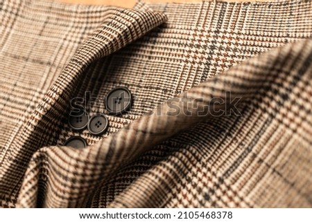Fabric ready-made suit textile shades in the workplace, tailor or tailor, close view, atelier