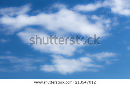 cloudscape with blue sky background