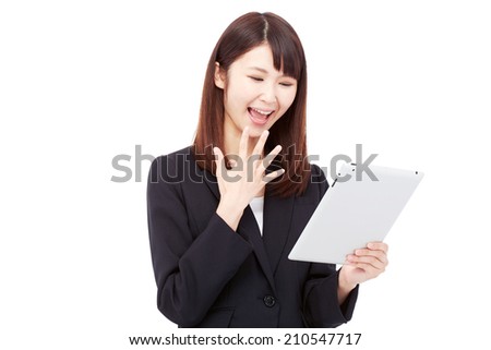 surprised businesswoman with the tablet