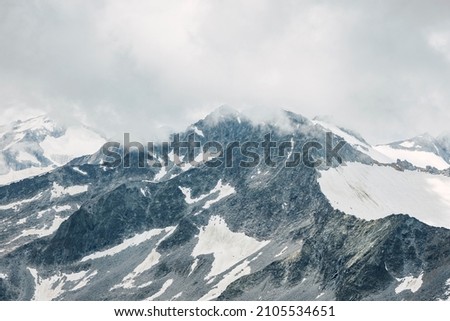 Snow-capped peaks on the Italian Alps. The picture was taken on the top of Presena glacier (Trentino-South Tyrol).