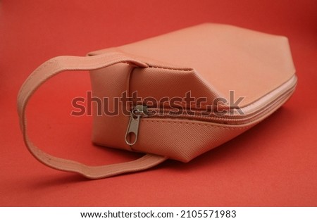 Pink pouch photo. suitable for sales, advertising, packaging, etc.            Royalty-Free Stock Photo #2105571983