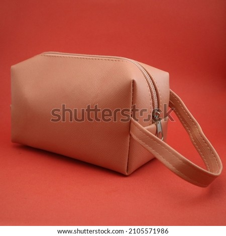 Pink pouch photo. suitable for sales, advertising, packaging, etc.            Royalty-Free Stock Photo #2105571986
