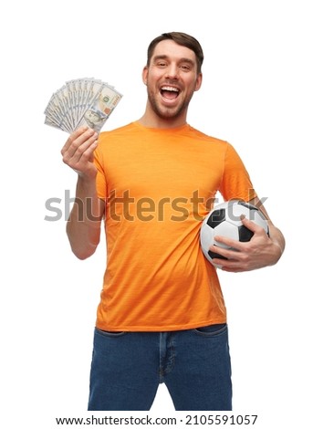 sport, leisure games and online betting concept - happy smiling man or football fan with soccer ball and money over white background Royalty-Free Stock Photo #2105591057