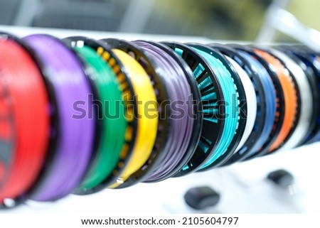 Coils with bright multi-colored wire, close-up, blurry
