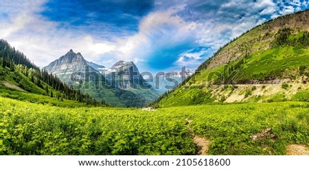 Majestic view over the Glacier National Park from the Going to sun road, Montana Royalty-Free Stock Photo #2105618600