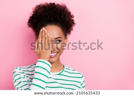 Photo of impressed bun hairstyle young lady close face look promo wear white shirt isolated on pink color background