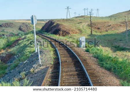 railway, railroad, rail, elevated. steppe.- is a means of transportation and passengers of trucks moving on rails that are located on the rails of the Great Plains. Kazakhstan The steppe is great.