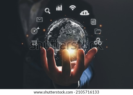 Businessman holding virtual Global network connection Financial and banking, Digital marketing, Multimedia, Storage and a large database big data Through internet technology.