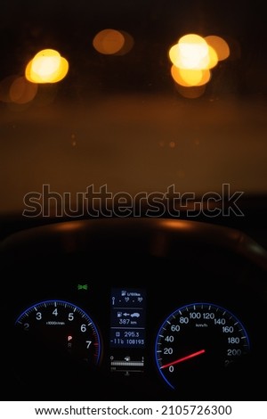 speedometer on the dashboard of a car to glow in the dark at night