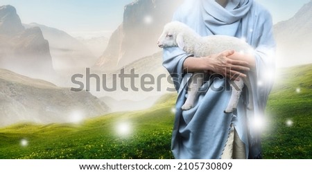 Jesus recovered the lost sheep carrying it in his arms. Biblical story conceptual theme. Royalty-Free Stock Photo #2105730809