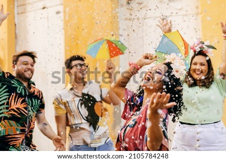 Brazilian Carnival. Group of friends celebrating carnival party Royalty-Free Stock Photo #2105784248