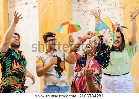 Brazilian Carnival. Group of friends celebrating carnival party Royalty-Free Stock Photo #2105784281
