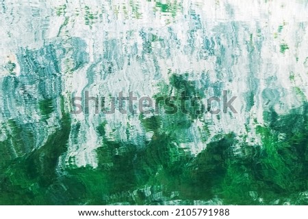 Natural green and white background imitating watercolor. important surface with reflections. Copy space.