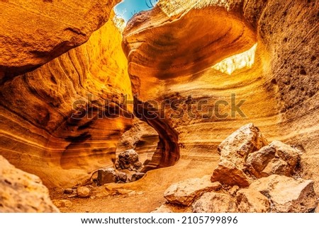 Amazing orange canyon called Barranco de las vacas located in heart of Grand Canaria, Canary Islands, Spain Royalty-Free Stock Photo #2105799896