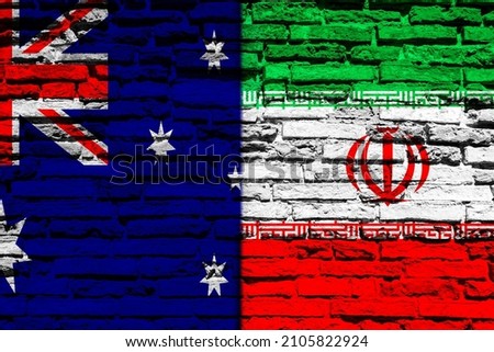 Background with flag of Iran and Australia on a brick wall