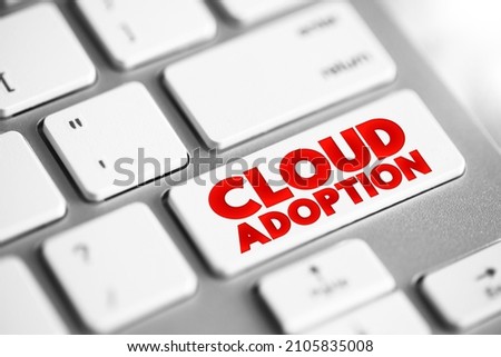 Cloud Adoption is a strategic move by organisations of reducing cost, mitigating risk and achieving scalability of data base capabilities, text concept on keyboard