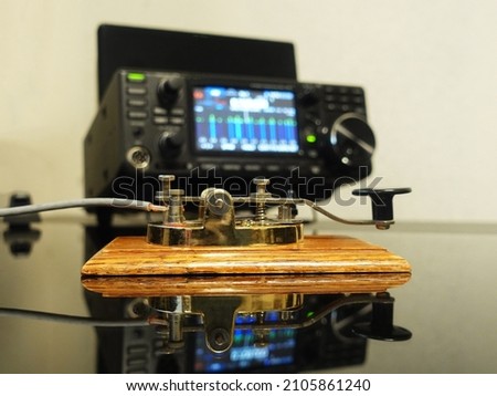Selective focus on a telegraph key with radio defocused in background