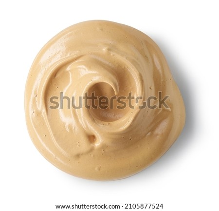 whipped caramel and coffee mousse cream isolated on white background, top view
