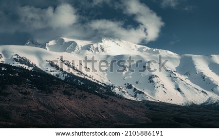 Winter landscape. Snowy mountains Snow covered background of mountain peaks. winter wonderland