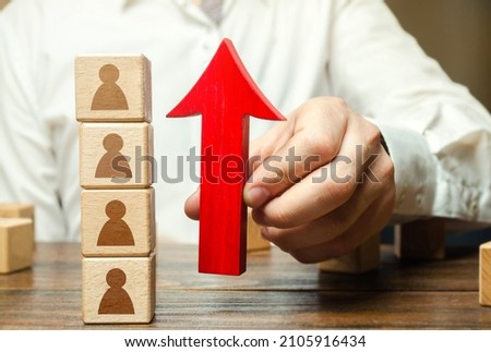Businessman recruits new employees. Professional development and training, improvement of human resources. Boost morale. Promotion. Team building, teamwork cooperation. Employment. Personnel selection Royalty-Free Stock Photo #2105916434