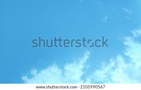 Sky background on sunset. Nature composition. Panoramic sunset sky background. Sunrise sky with lighted clouds. Beauty evening sunrise.