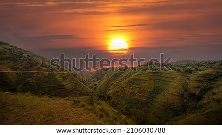 Beautiful landscape in southwestern Uganda, at the Bwindi Impenetrable Forest National Park, at the borders of Uganda, Congo and Rwanda. The Bwindi National Park is the home of the mountain gorillas Royalty-Free Stock Photo #2106030788