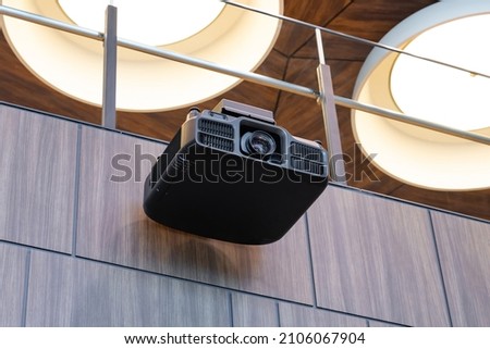 Projector mounted on a ceiling Royalty-Free Stock Photo #2106067904