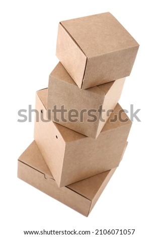 stack of cardboard boxes of brown kraft paper on a white background , moving concept
