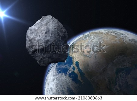 Dangerous asteroid approaching to planet Earth. Concept a potentially hazardous object (PHO). Stony-iron meteorit is solar system. Elements of this image furnished by NASA Royalty-Free Stock Photo #2106080663