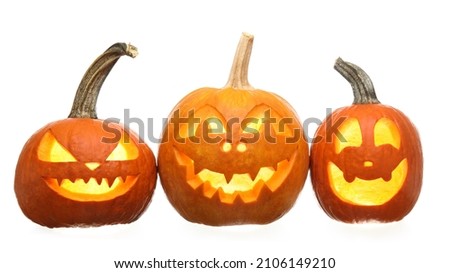 Carved pumpkins for Halloween on white background