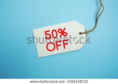 50% off tag with space copy on blue background