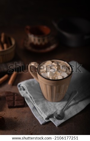 Delicious and simple beverage with chocolate sticks