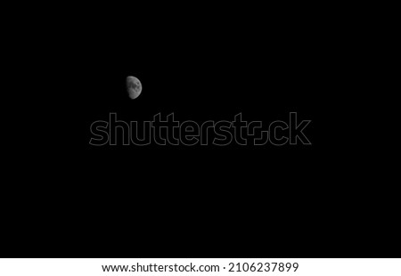 Lunar craters in black and white, night view. Astronomy. Moon at night.