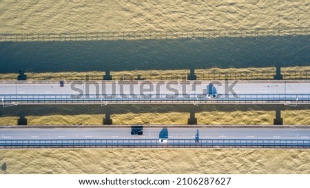 High angle view of concrete bridge across the sea