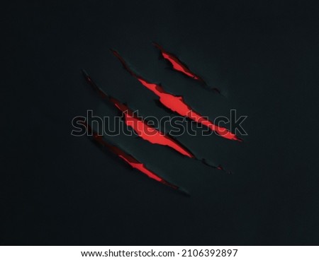 Tigers claw mark. Chinese new year 2022.  Background. Copy space. Royalty-Free Stock Photo #2106392897