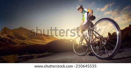 Road cyclist  Royalty-Free Stock Photo #210645535